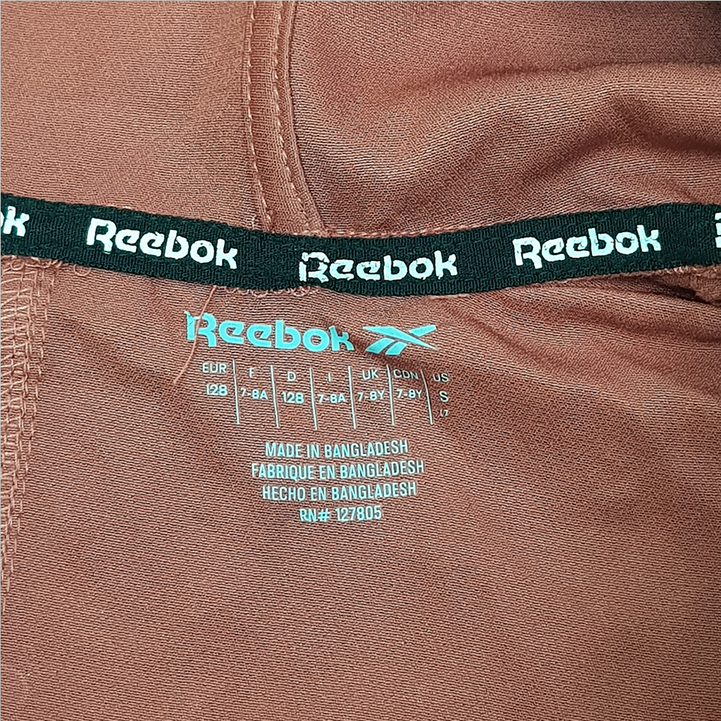 مانتو کلاه دار دخترانه 20839 سایز 7 تا 10 سال مارک Reebok